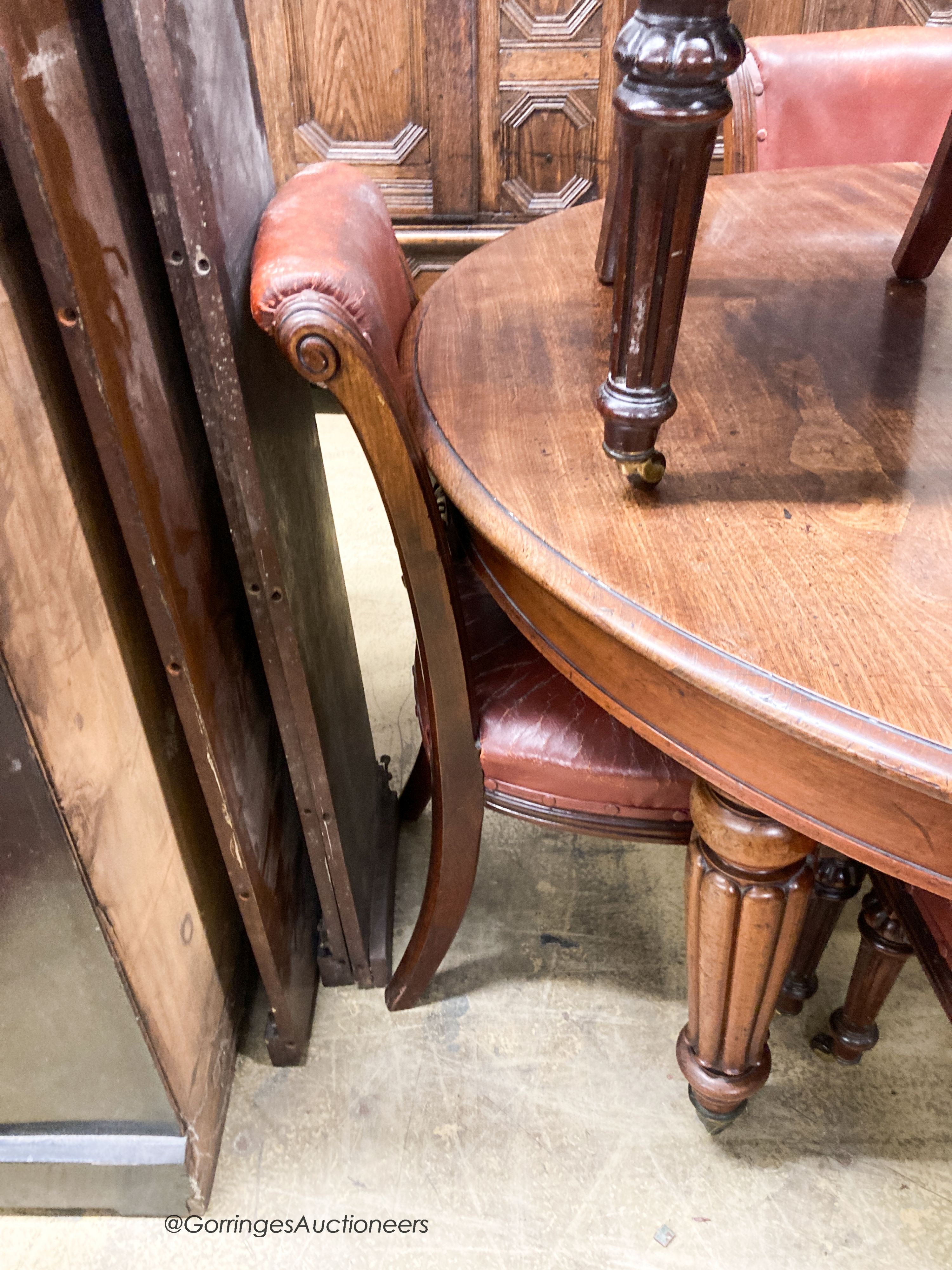 A set of six Victorian leather and mahogany dining chairs